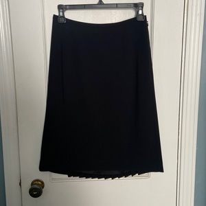 Ann Taylor black skirt. Back Pleats NWT